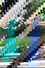 Green shimmer gown with side cutouts and open back design