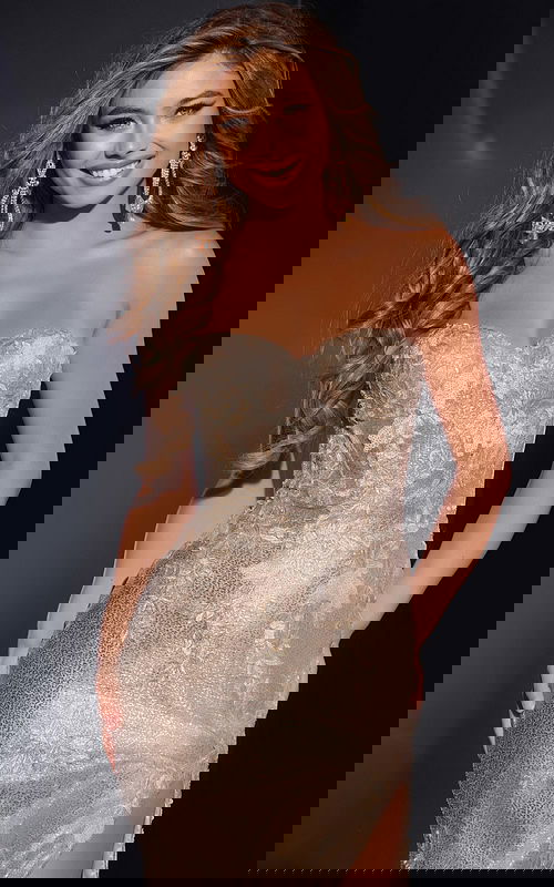 model showcasing Jovani 43587 gold dress with floral lace detailing