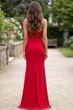Back view of strapless red gown with beaded bodice and sleek column skirt.