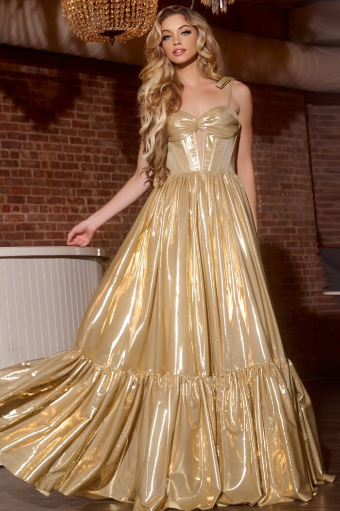 Model wearing Jovani 43596 gold gown with sweetheart neckline and bow tie straps