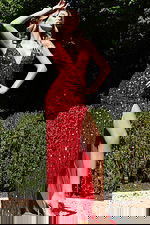 Sparkling gown with plunging neckline and intricate beaded detailing