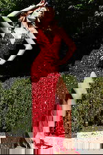 Sparkling gown with plunging neckline and intricate beaded detailing