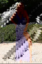 Lavender sequin gown with deep V neckline and thigh-high slit