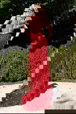 Radiant sleeveless sequin gown featuring a plunging neckline