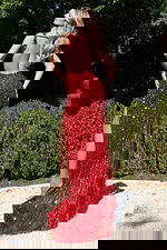 Radiant sleeveless sequin gown featuring a plunging neckline