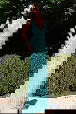 Shimmering gown with mirrored beadwork and figure-accentuating design