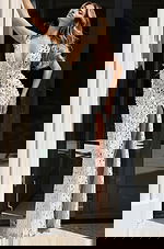 Sequin V-neck gown with figure-hugging silhouette and shimmering finish