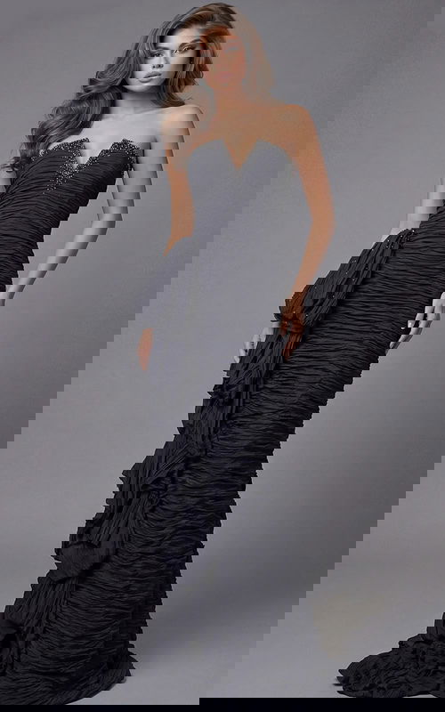 Strapless fitted gown with ruched texture, crystal-trimmed neckline, and cascading side ruffle