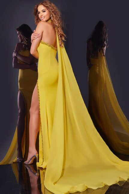 Back view of the Jovani 43658 yellow gown with flowing train.