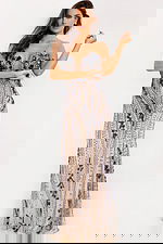 Sheer tulle evening dress with blue and silver embellished patterns