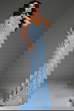 Model wearing Jovani 43760 blue lace mermaid gown with sweetheart neckline, front view.