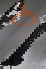 Front view of model in Jovani 43760 black lace mermaid dress with sweetheart neckline.