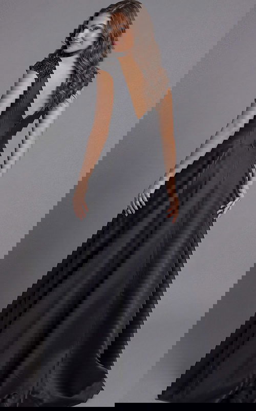 Back view of Jovani 43809 black satin A-line ball gown featuring a deep V-back, beaded cap sleeves, and full floor-length pleated skirt.