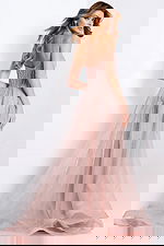 Blush pink prom gown with corset top and shimmering beaded design