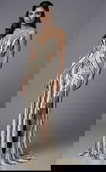 fitted evening gown with low open back and vertical sequin detailing