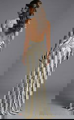 Open back formal gown with slim silhouette and geometric sequin pattern