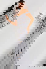 Off shoulder gown adorned with intricate gold and silver floral beadwork, fitted through the bodice and flowing into a soft mermaid silhouette.