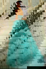 Back view of layered tulle evening gown with sheer corset bodice