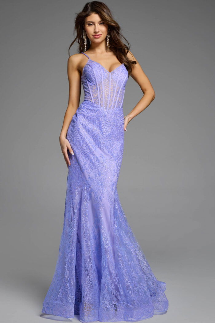 Elegant gown with sheer bodice and shimmering embellishments.