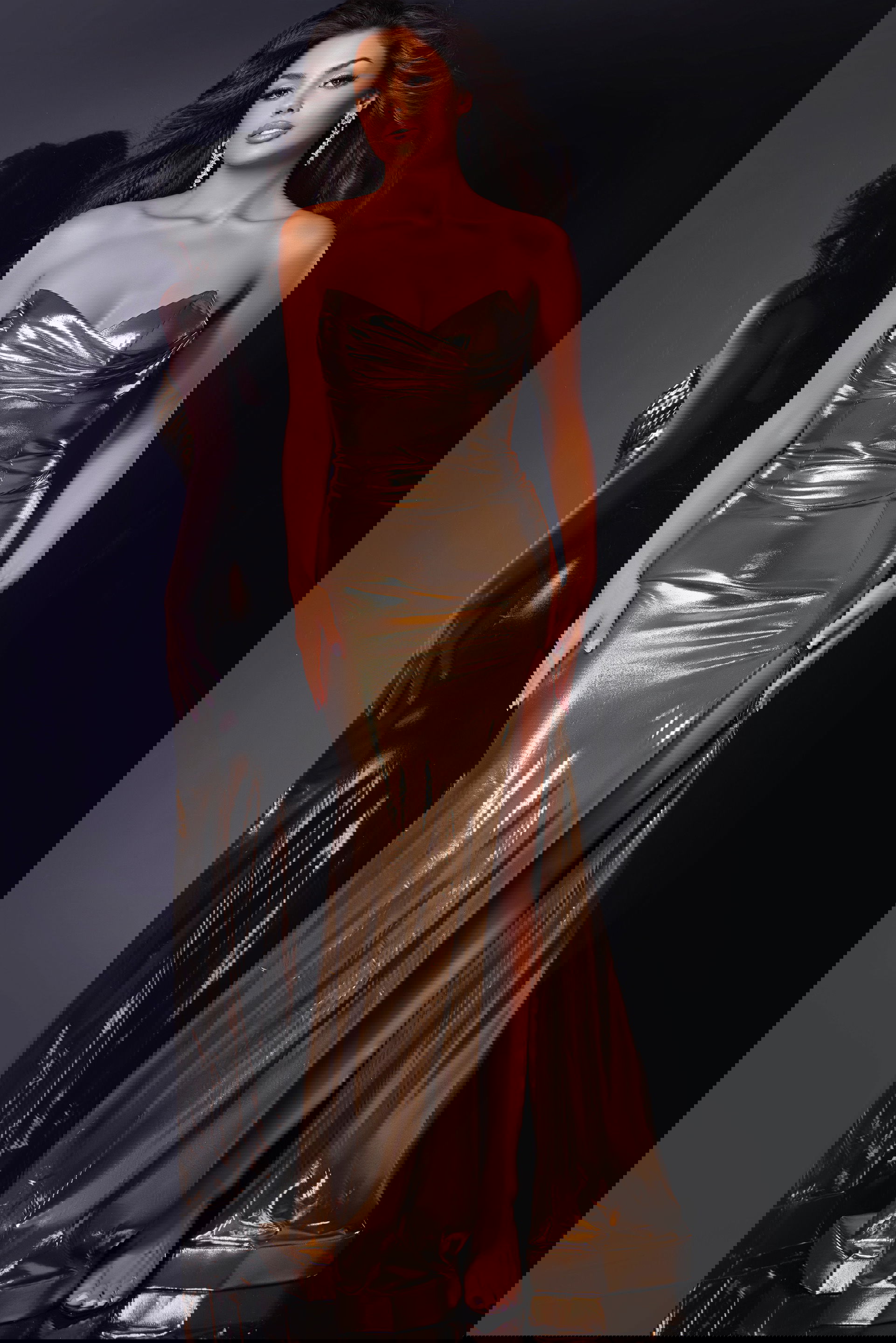 44146 Model wearing Jovani 44146 metallic gold dress with sweetheart neckline and high slit, front view