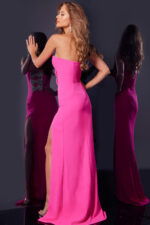 Model wearing Jovani 44155 pink gown, back view showing silhouette.