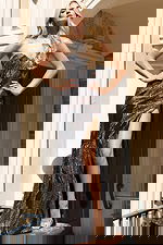 Black sequin gown with metallic swirl and train