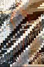 Shimmering black evening dress with sculpted silhouette