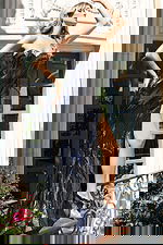 Strapless formal gown with sequin texture and flowing skirt