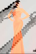 Strapless satin gown featuring a fitted bodice, ruched detailing, and a sleek mermaid silhouette.