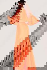 orange memraid evening dress with bolero jacket.