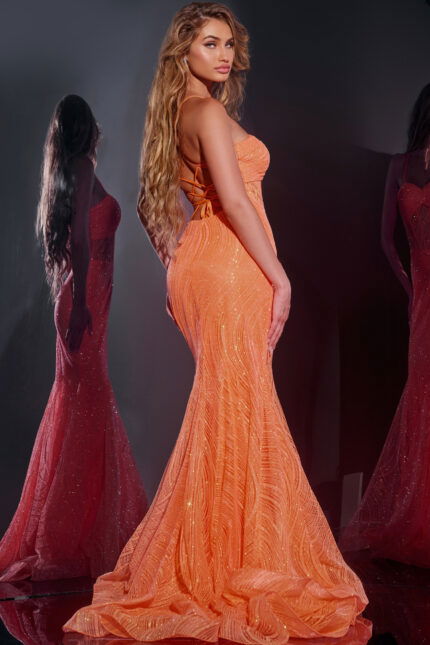 Back view of Jovani 44208 orange gown highlighting lace-up design and mermaid silhouette.