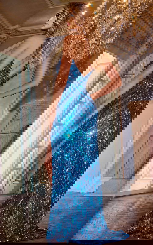 Back view of model in Jovani 44270 blue sequined dress.