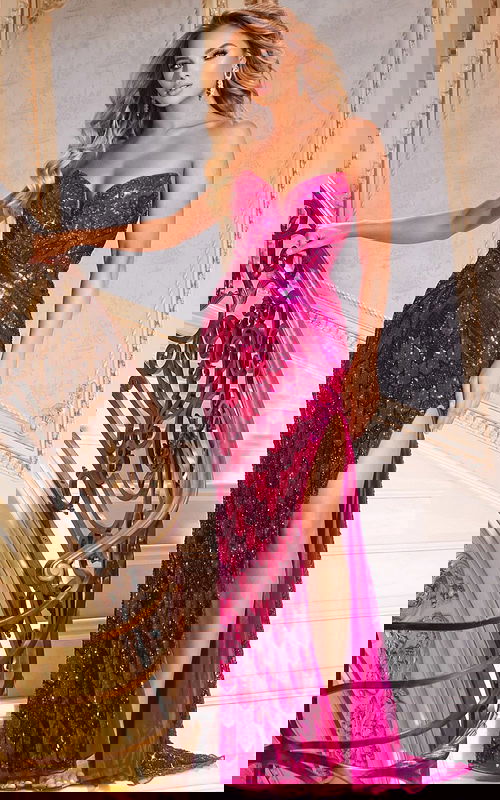 Model wearing Jovani 44270 fuchsia sequined dress with sweetheart neckline and high slit.