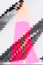 Strapless pink prom gown featuring layered ruffle skirt