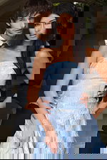 Floor-length metallic gown with structured silhouette