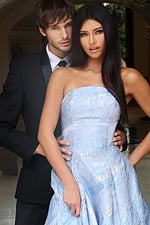 Floor-length metallic gown with structured silhouette