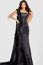 One-shoulder fitted gown adorned with black sequins, featuring floral appliqué accents and a sheer tulle train.