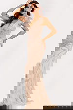 Floor length evening gown with V-neckline and ruffled shoulder detail