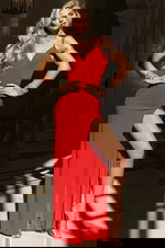 Glamorous sleeveless gown featuring sparkle cuffs and open shoulders