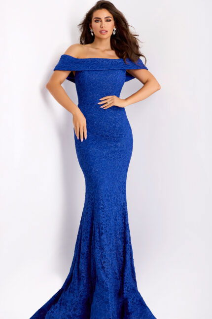 Front view of fitted formal lace gown with ruffle neckline