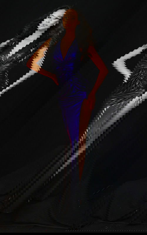 Purple metallic halter prom dress with ruched bodice and thigh-high slit