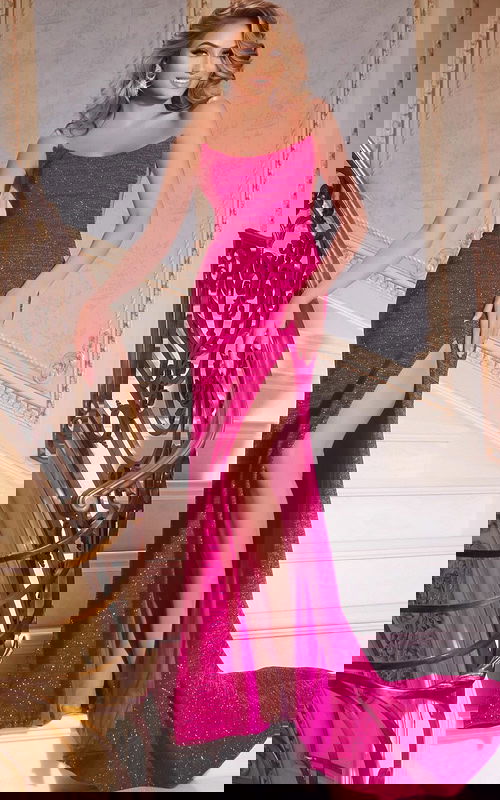 Model wearing Jovani 44427, a fuchsia sparkling gown with a scoop neckline and high slit.