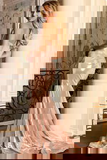 Glossy formal dress with structured top and train