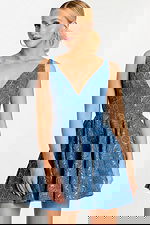 Front view of denim-textured mini dress with floral embroidery and plunging neckline