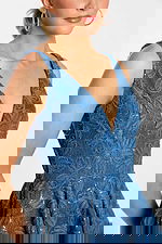 lose-up of plunging bodice with raised floral embroidery and scattered sequins