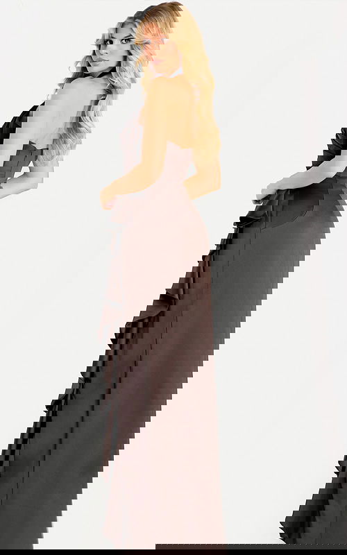 Brown satin evening gown featuring halter neckline and draped detailing