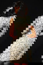 Short ivory sequin short dress with structured shoulder detail and fitted bodice