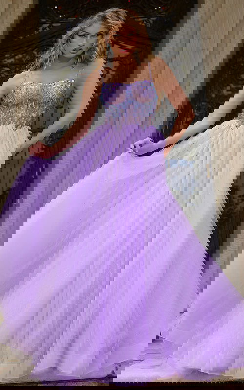 Model wearing Jovani 44511 lilac gown with embellished bodice.