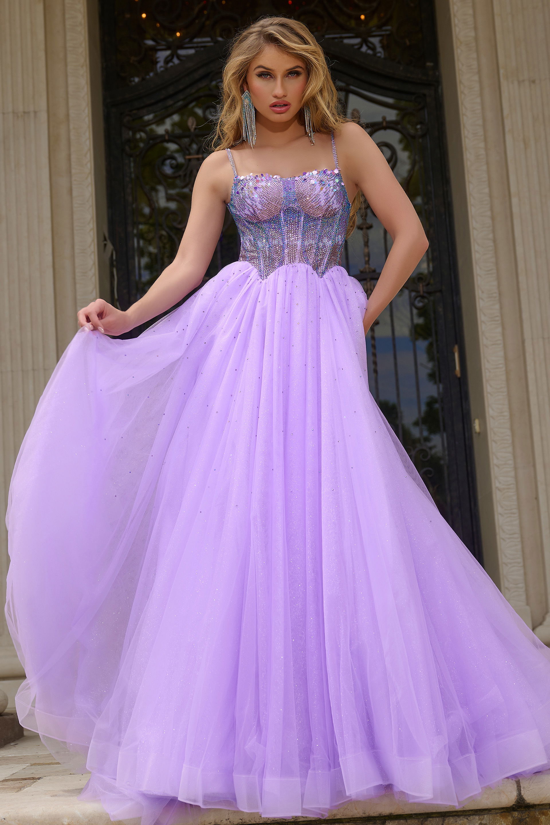 44511-lilac-ballgown Model wearing Jovani 44511 lilac gown with embellished bodice.
