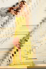 Yellow ruffle gown with lace corset bodice and slit